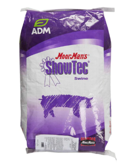 Bag of MoorMan's ShowTec Swine feed with ADM branding on a white background
