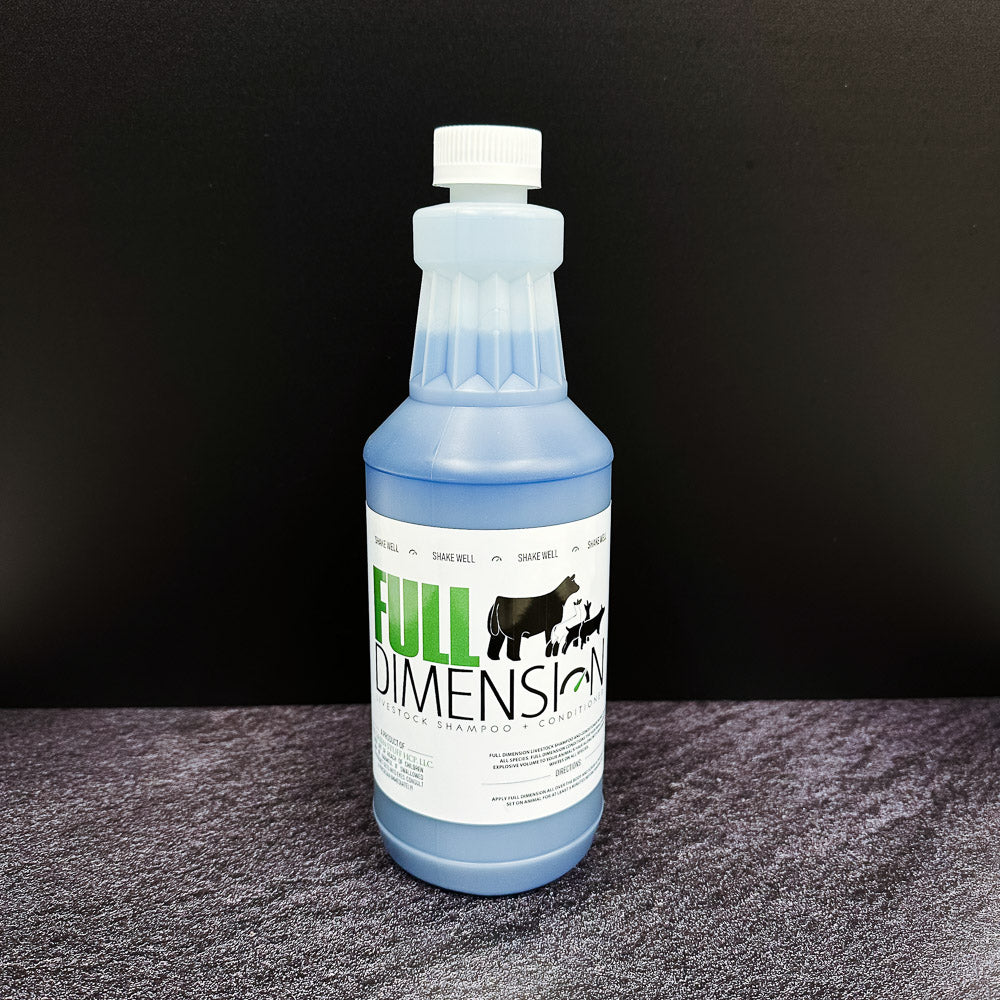 Bottle of Full Dimension shampoo on a white background