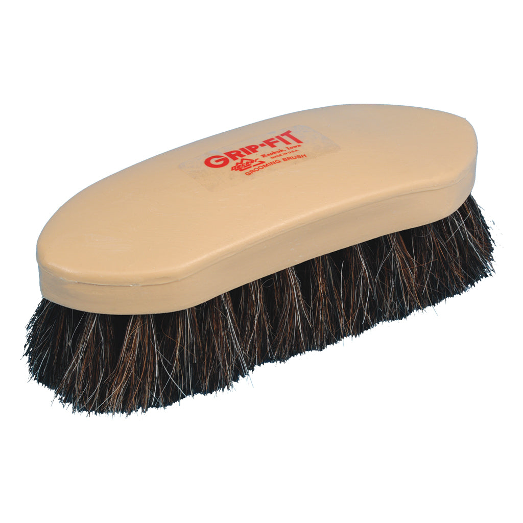 Beige brush with black bristles on a white background, featuring 'Grip Fit' branding.