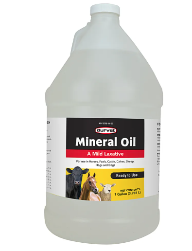 Gallon container of mineral oil with a label on a white background