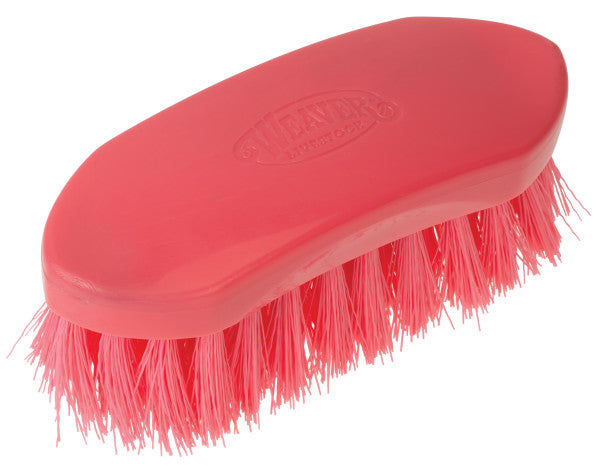 Red brush with bristles on a white background