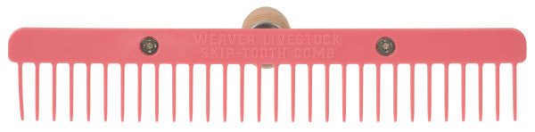 Pink comb with gold accents on a white background