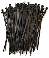 Collection of black cable ties on a white background