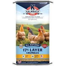 Kalm Bach 17X Layer Crumbles chicken feed bag with chickens on a scenic background