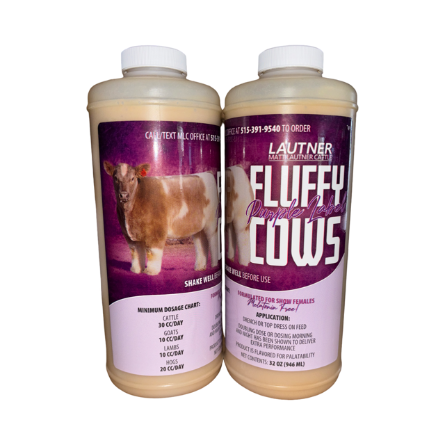 Two bottles of 'Fluffy Cows' product with a cow illustration on a white background