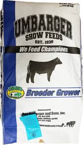 Umbarger Show Feeds Brooder Grower feed bag with a cow illustration on a white background