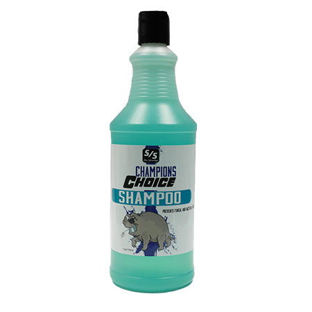 Bottle of Champions Choice shampoo with a pig graphic on the label, against a white background.