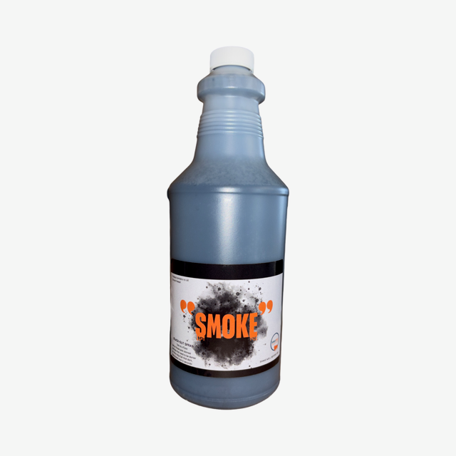 Bottle of smoke fluid with a label on a white background