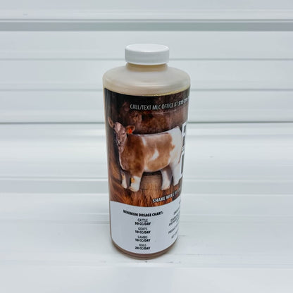 Bottle with a label featuring an image of a goat on a white background
