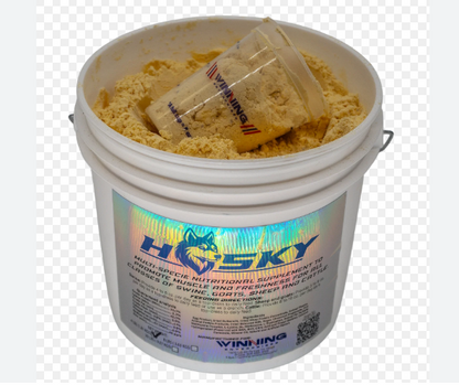 Bucket of HUSKY supplement with a transparent container on a white background