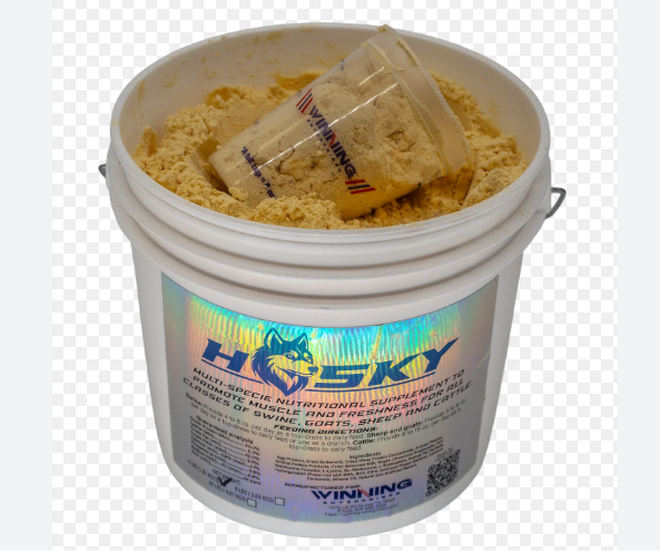 Bucket of HUSKY supplement with a transparent container on a white background
