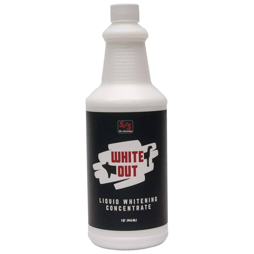 White bottle of liquid whitening concentrate with a black label on a white background