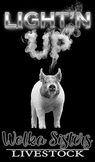 Pig with smoke effect and text 'Light'n Up' and 'Wolka Sisters Livestock' on a black background