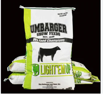 Umbarger Show Feeds Lighten Up feed bags on a black background
