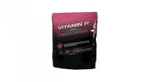 Vitamin supplement package with pink and black design on a white background