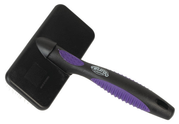 Black and purple pet grooming brush with a visible brand logo on a white background